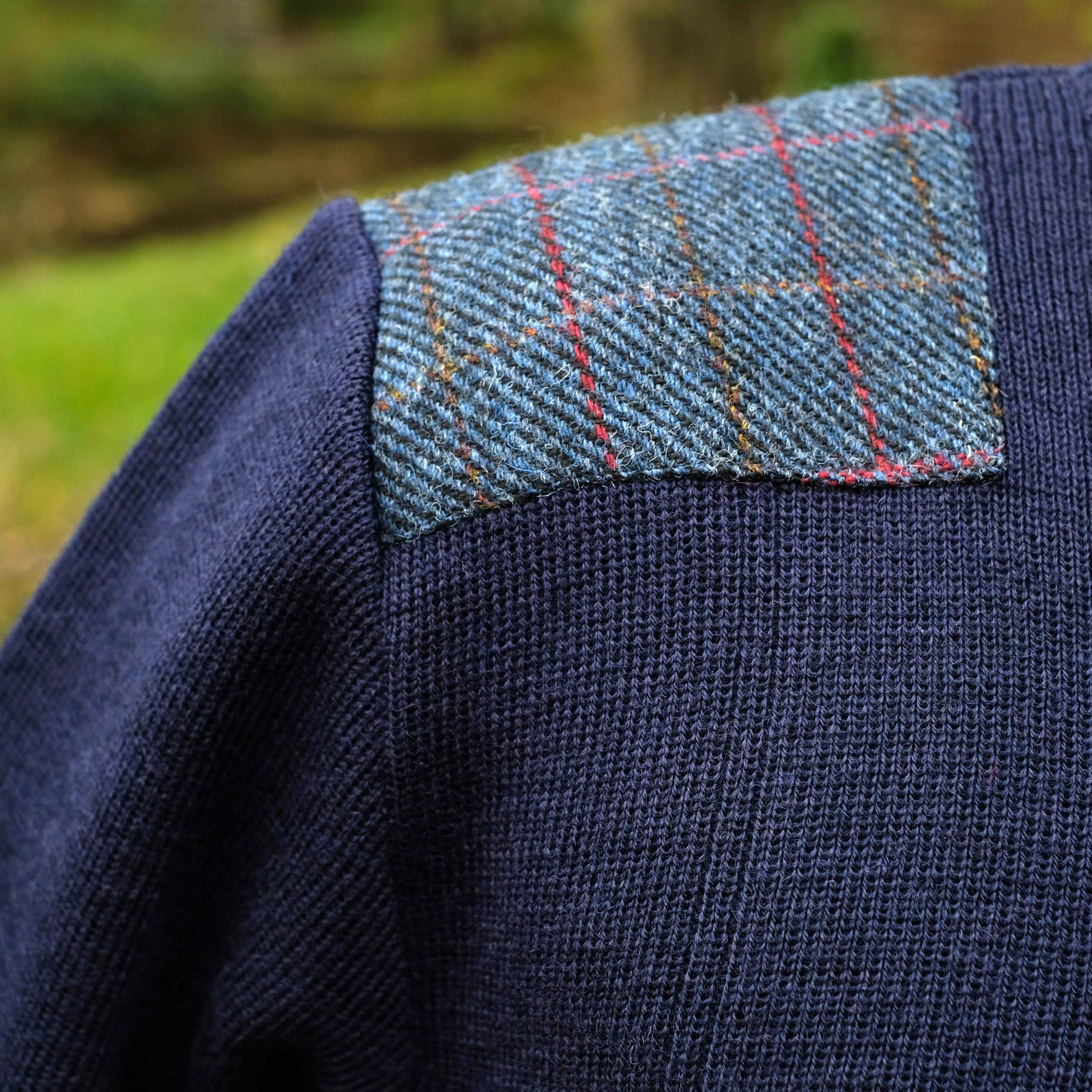 Military style jumper with Harris Tweed shoulder patches in navy